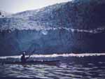 Photo of Ian paddling below Tiger Glacier, Prince William Sound